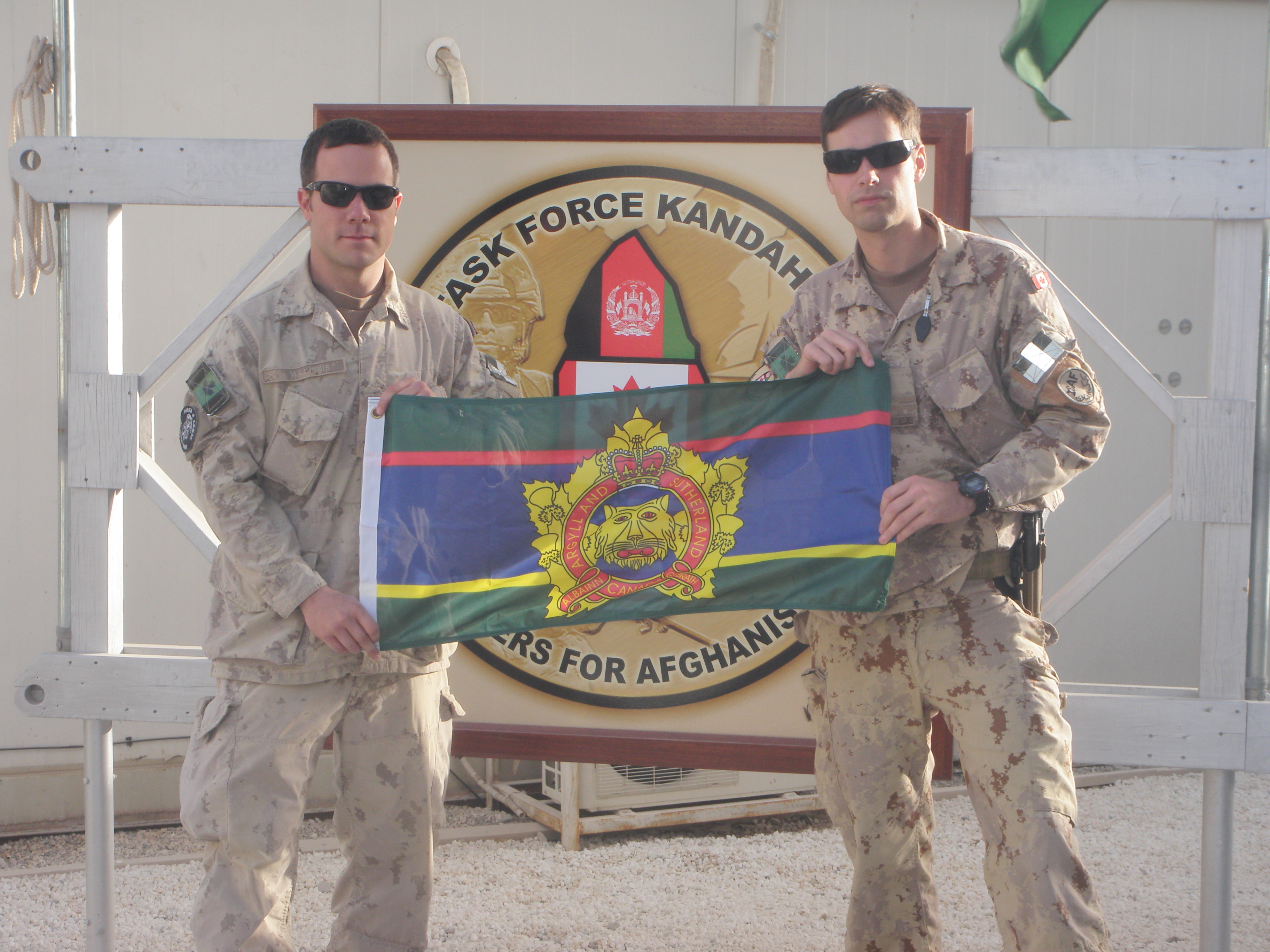 Capts Adam R. MacInnis and Robert L. Fraser, Kandahar, Afghanistan, 6 Dec. 2010.